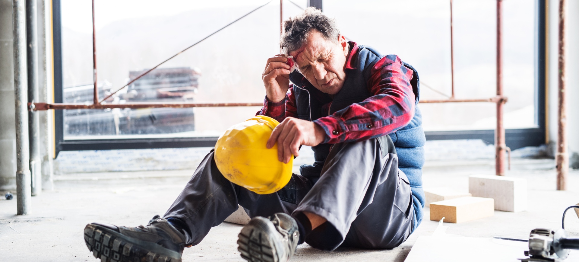 worker with a head injury injured at work and seeking a workers' compensation claim