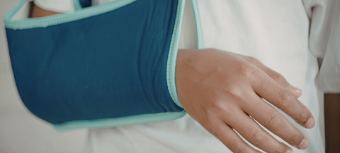 injured arm in a sling after an accident